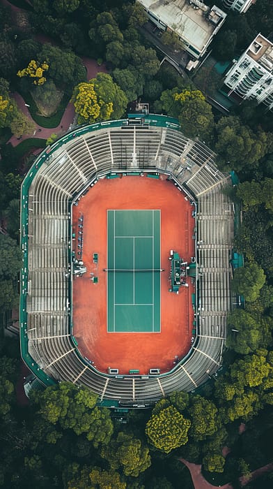sport_infra tennis stadium, top photography --ar 9:16 --style raw --v 6 Job ID: cff235ba-b0c6-4805-bc1f-bf525f098237
